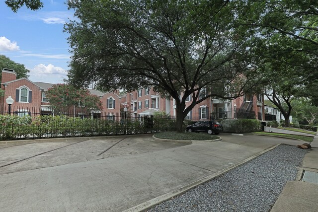 view of road featuring curbs and a residential view