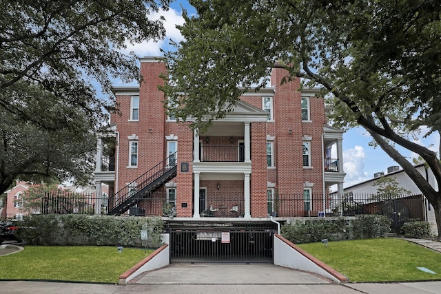 view of building exterior with fence