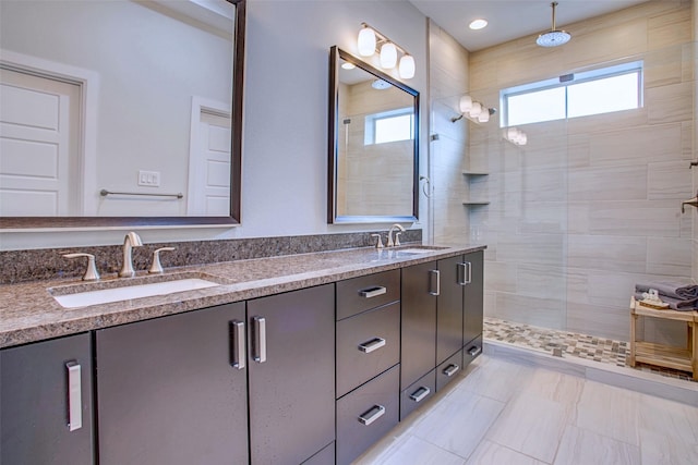 bathroom with vanity and walk in shower