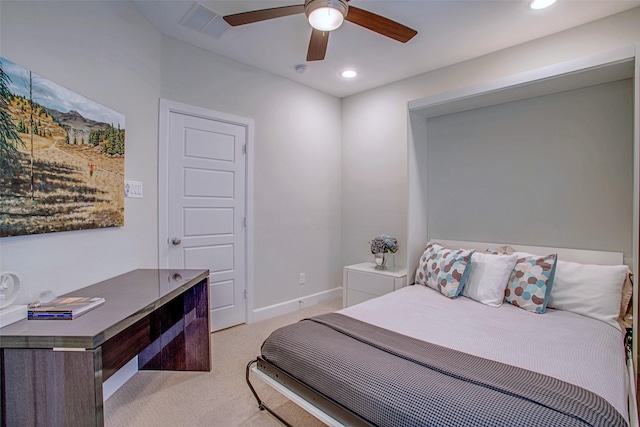 bedroom featuring ceiling fan and light carpet