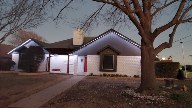 view of front of property with a carport