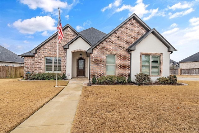 view of front of property with a front lawn