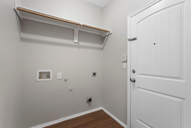 laundry room with hookup for a gas dryer, washer hookup, dark wood-type flooring, and hookup for an electric dryer