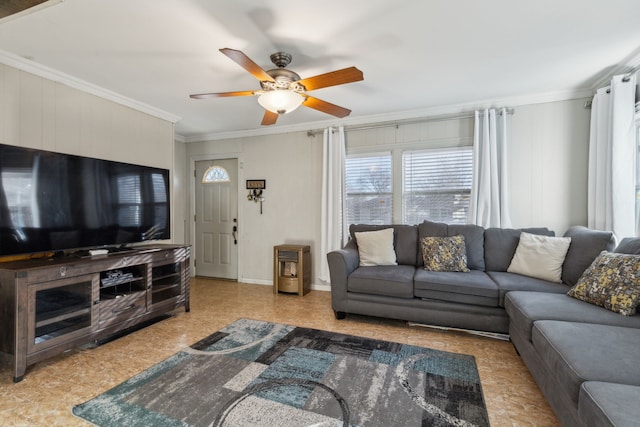 living room featuring crown molding and ceiling fan