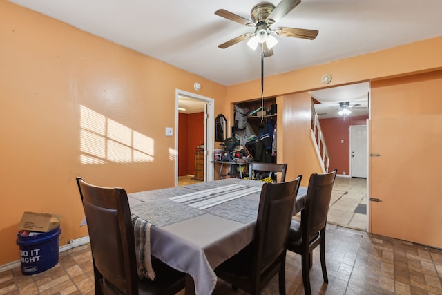 dining room with ceiling fan