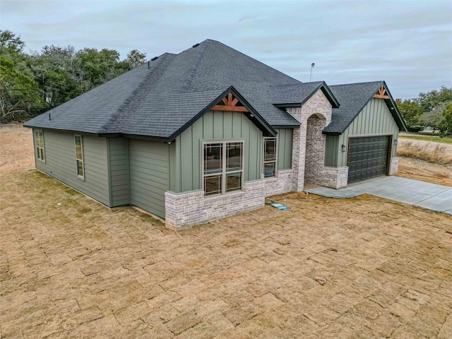 view of front of property with a garage