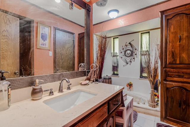 bathroom featuring tile patterned floors and vanity