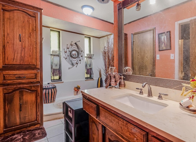 bathroom featuring vanity and tile patterned flooring