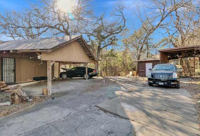 view of parking featuring a carport