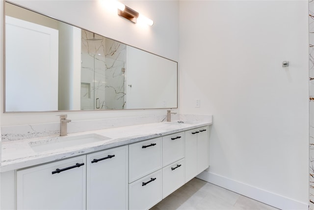 bathroom featuring walk in shower and vanity