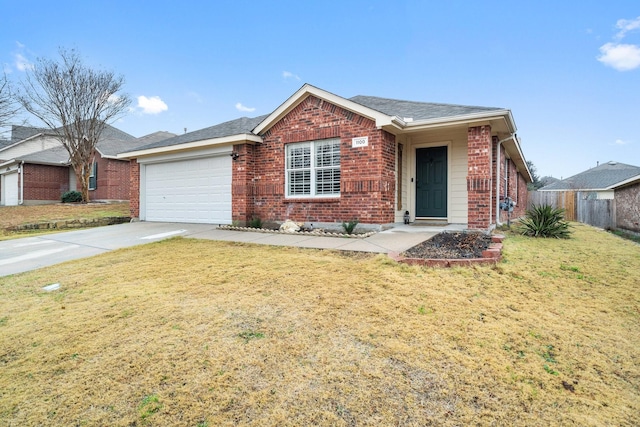 ranch-style house featuring a garage and a front yard