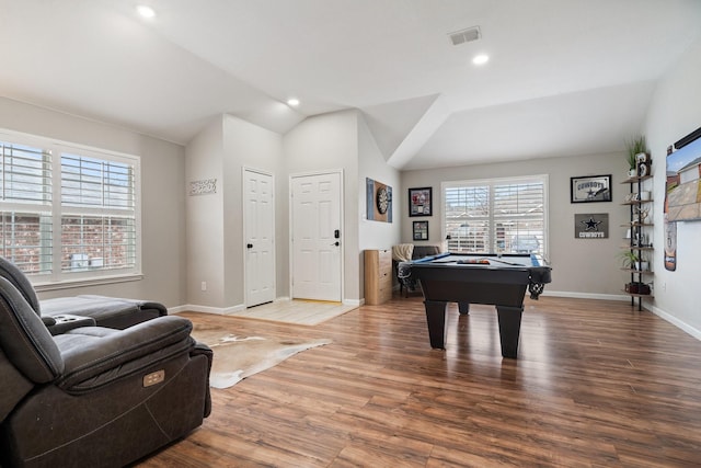 recreation room featuring pool table, wood finished floors, visible vents, baseboards, and vaulted ceiling