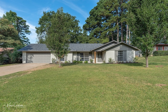 single story home with a garage and a front lawn