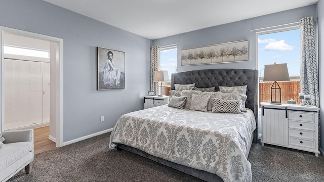 bedroom featuring dark carpet