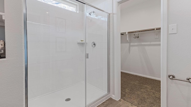 bathroom featuring walk in shower