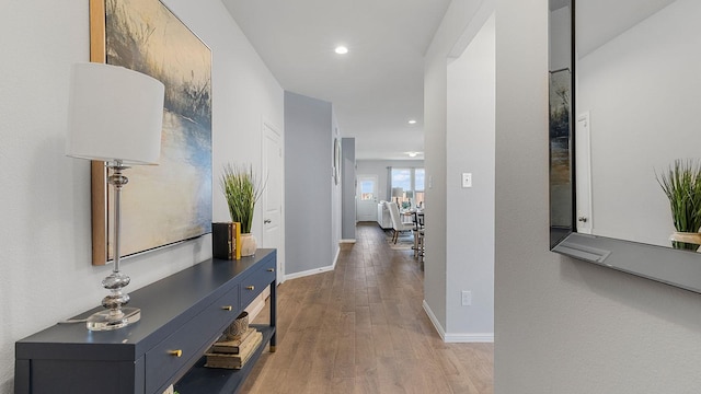 hallway featuring wood-type flooring