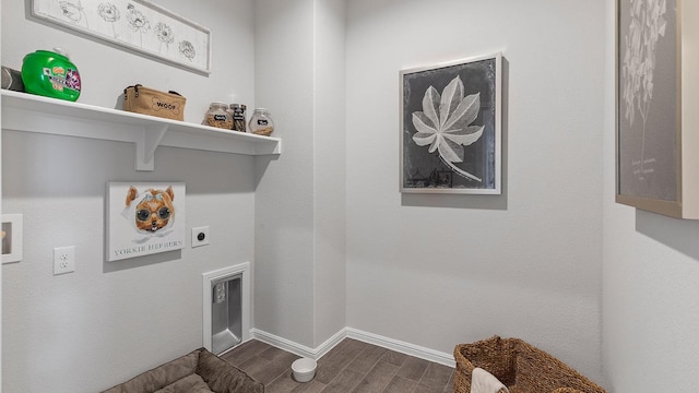 washroom with electric dryer hookup and dark hardwood / wood-style floors