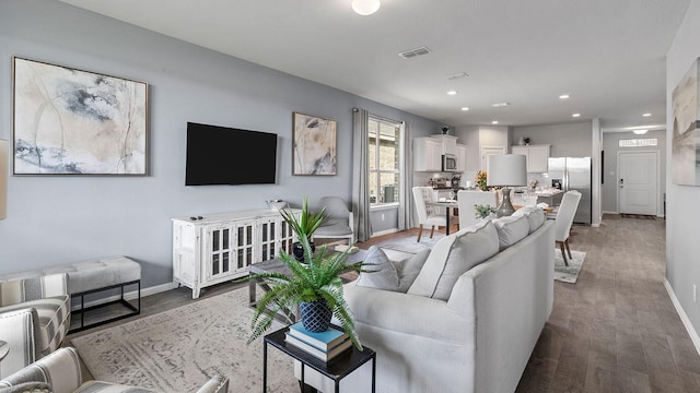 living room with hardwood / wood-style floors