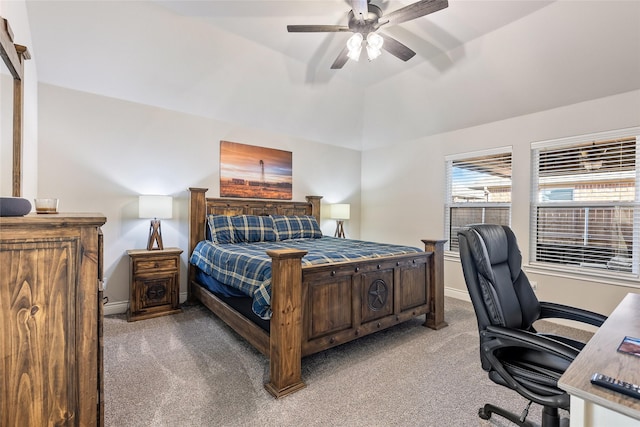 bedroom featuring lofted ceiling, light colored carpet, and ceiling fan