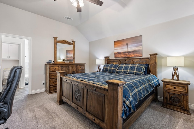 carpeted bedroom with vaulted ceiling and ceiling fan