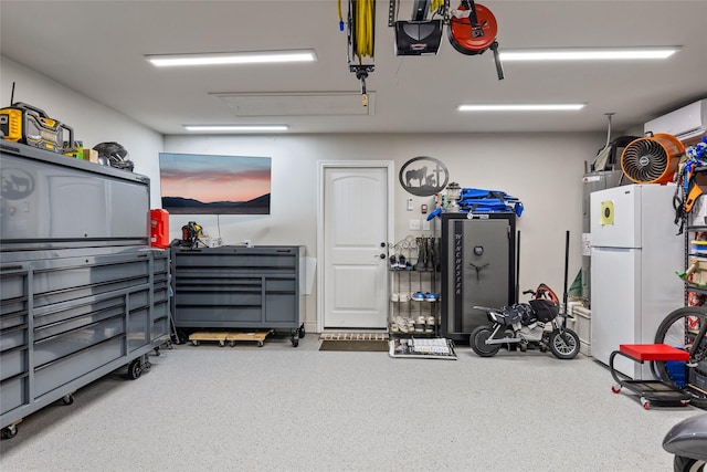 garage featuring a garage door opener, white fridge, and a wall mounted AC