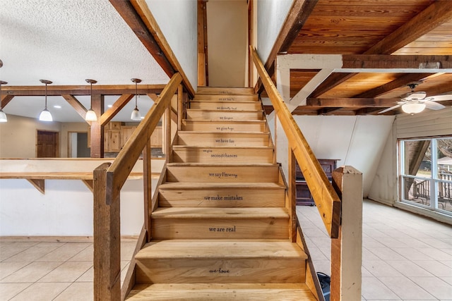 staircase with tile patterned flooring, wood ceiling, beam ceiling, and ceiling fan