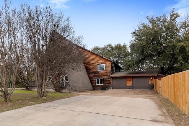 exterior space with a garage