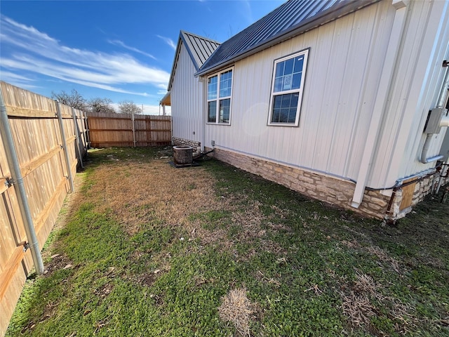 view of home's exterior with a yard