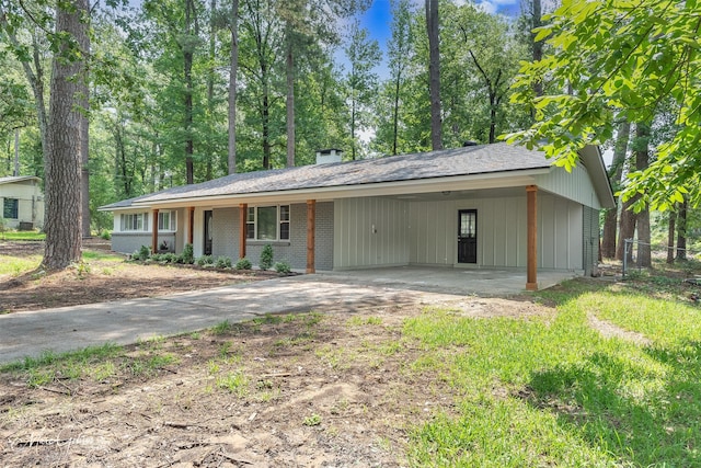 ranch-style house with a carport