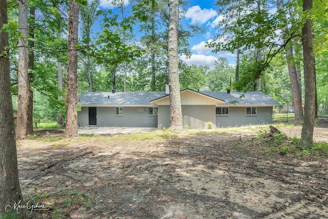 rear view of house featuring a patio area