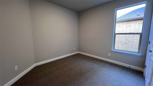 spare room with carpet floors