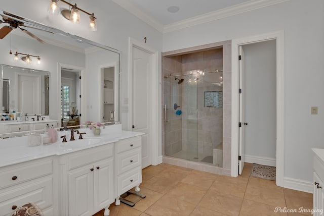 bathroom featuring a shower with door, ornamental molding, vanity, and ceiling fan