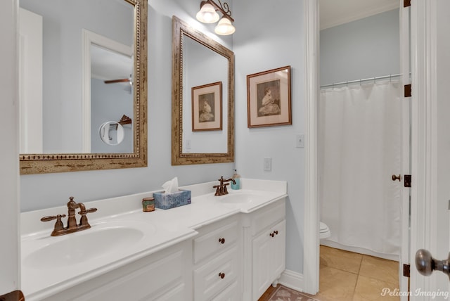 bathroom with vanity, tile patterned floors, toilet, and a shower with shower curtain