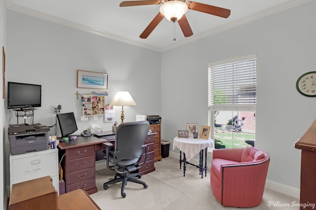 carpeted home office featuring ceiling fan and ornamental molding