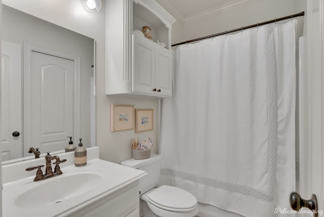 bathroom featuring crown molding, vanity, toilet, and a shower with shower curtain