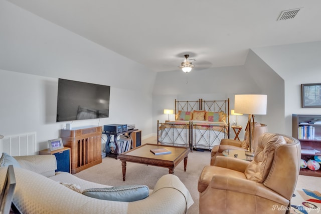 interior space with vaulted ceiling and carpet flooring