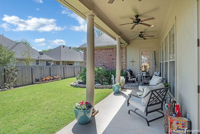 view of patio featuring ceiling fan