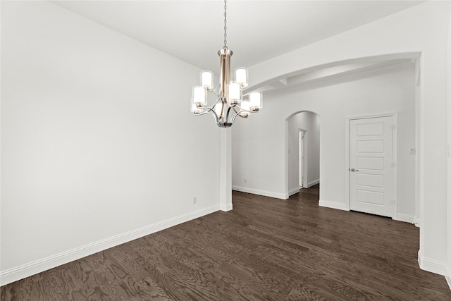 unfurnished dining area featuring dark hardwood / wood-style floors and a notable chandelier