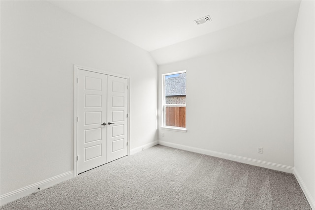 3121 Blue Hl, Burleson, TX 76028 - carpeted empty room with baseboards, lofted ceiling, and visible vents