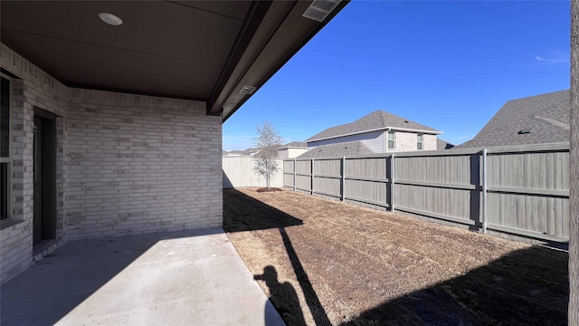 view of yard with a patio area