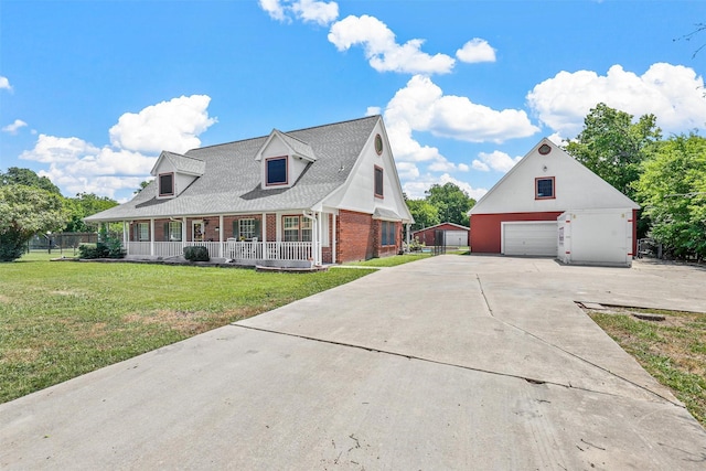 new england style home with a front lawn and a porch