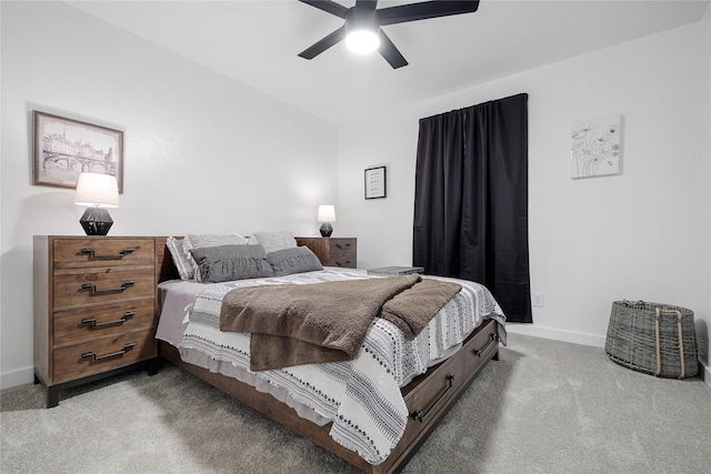 bedroom featuring ceiling fan and light colored carpet