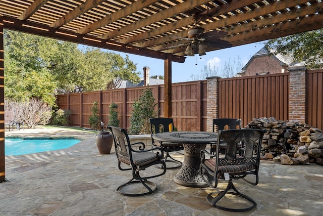 view of patio with a fenced in pool, ceiling fan, and a pergola