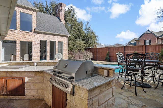 view of patio / terrace with area for grilling and grilling area