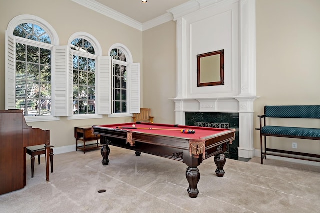 playroom featuring light colored carpet, ornamental molding, a premium fireplace, and pool table