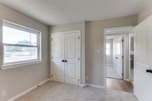 unfurnished bedroom featuring a closet