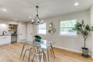 dining space with light wood-type flooring