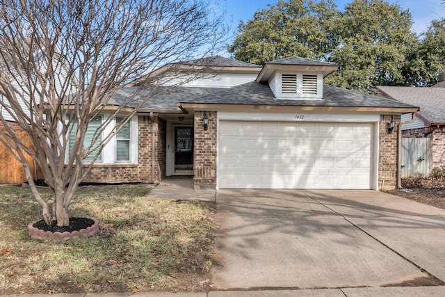 view of front of property with a garage