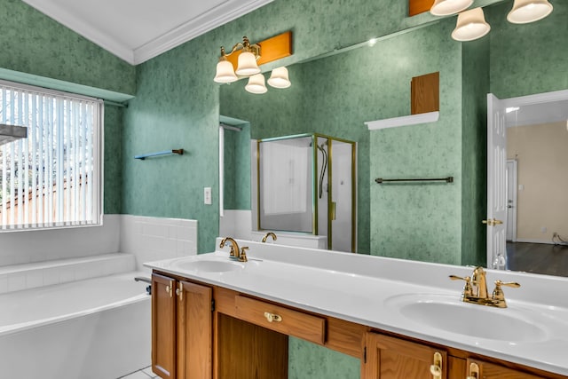 bathroom featuring vanity, separate shower and tub, and crown molding