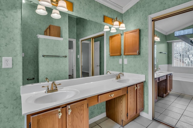 bathroom with vanity, tile patterned floors, ornamental molding, and a bathing tub